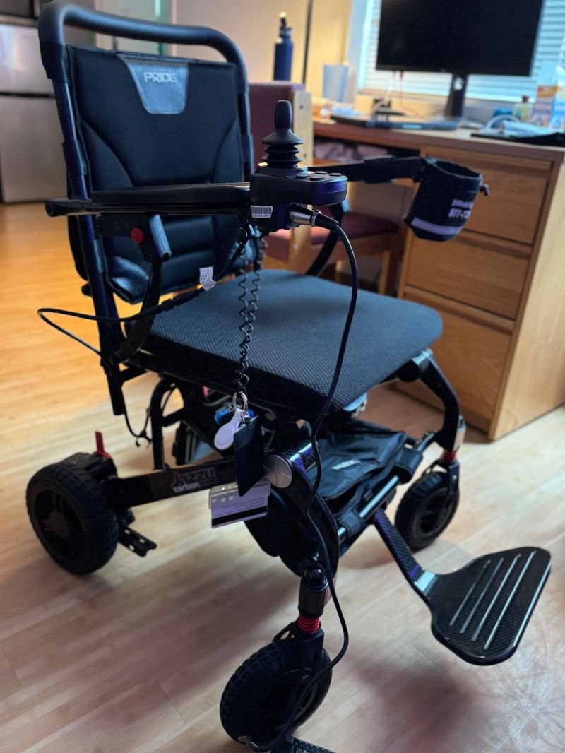 The folding power wheelchair Ryleigh Newman bought the day he stopped walking.